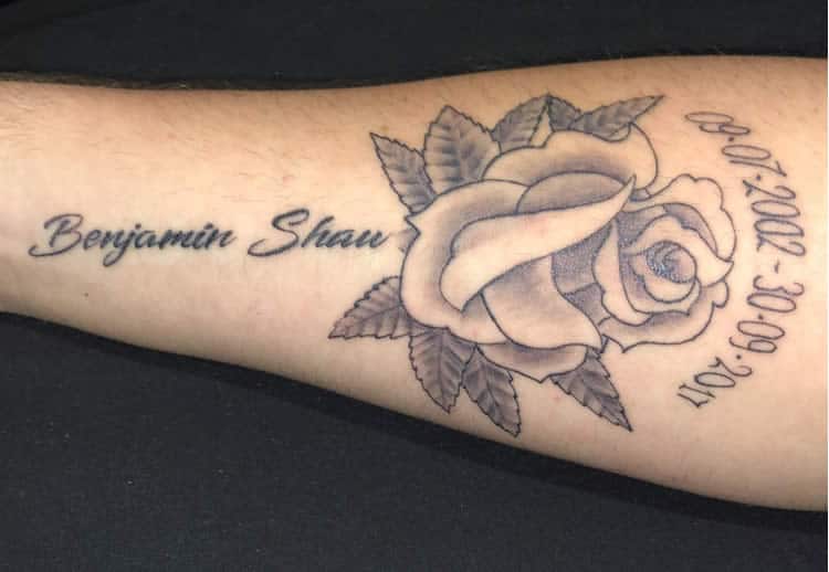 Benjamin's name tatooed on Brock's arm