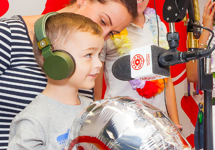 Boy talking on radio show