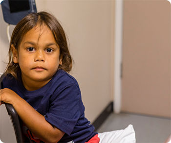 Child waiting in examination room